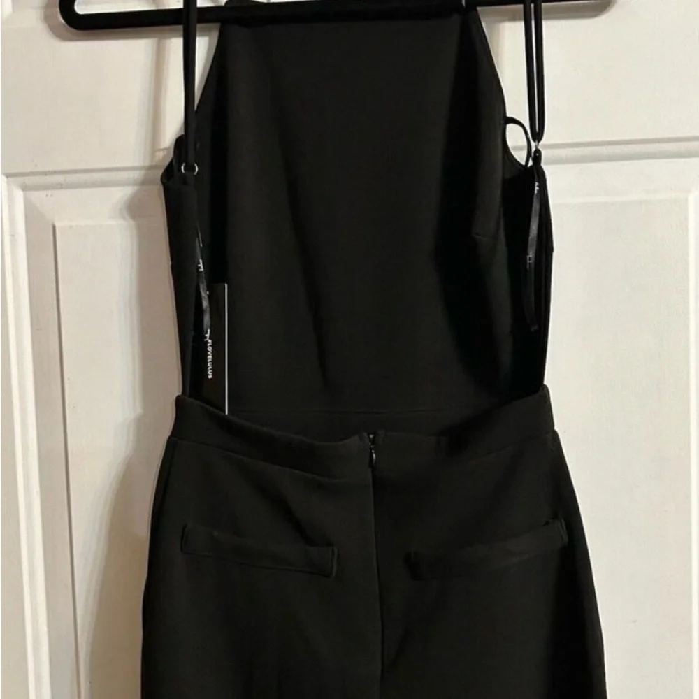 Lulu's Classic Black Jumpsuit - Picture 11 of 14